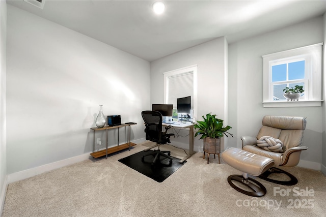 home office featuring baseboards and carpet flooring