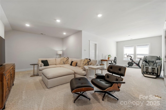 carpeted living room with recessed lighting, baseboards, and visible vents
