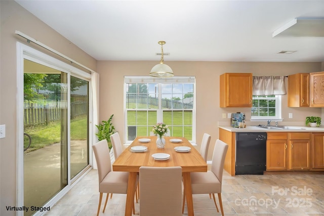 dining space featuring visible vents