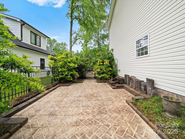 view of patio with fence