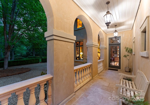 5030 Hardison Rd, Charlotte, NC 28226 - property entrance with a porch and stucco siding