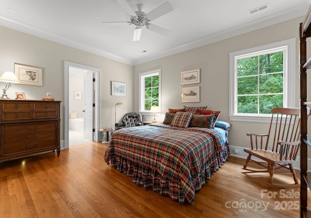 5030 Hardison Rd, Charlotte, NC 28226 - bedroom with ornamental molding, wood finished floors, baseboards, and ensuite bathroom