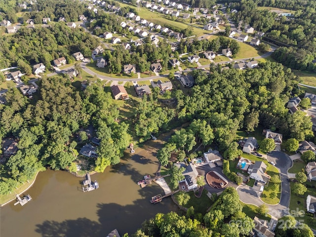 444 Snapdragon Dr, Clover, SC 29710 - aerial view of property's location featuring nearby suburban area, a nearby body of water, and a tree filled landscape