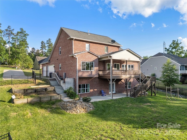 444 Snapdragon Dr, Clover, SC 29710 - back of property with stairs, brick siding, a patio, and a wooden deck