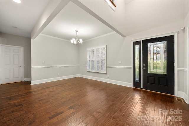444 Snapdragon Dr, Clover, SC 29710 - entryway featuring a chandelier, dark wood-style flooring, baseboards, and crown molding