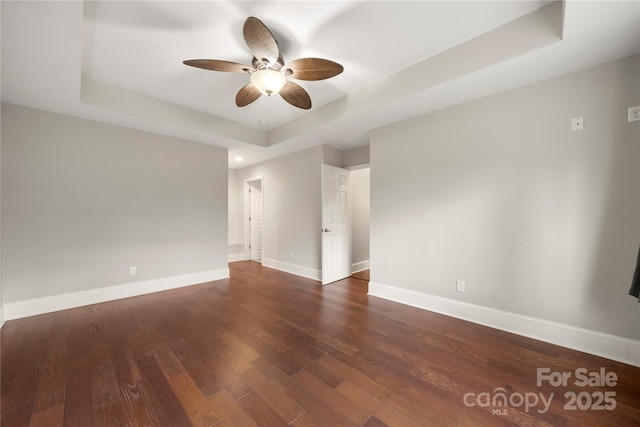 444 Snapdragon Dr, Clover, SC 29710 - unfurnished room featuring a tray ceiling, a ceiling fan, dark wood-style floors, baseboards, and recessed lighting