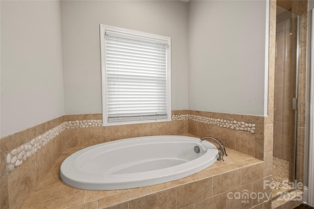 444 Snapdragon Dr, Clover, SC 29710 - bathroom featuring a garden tub and tiled shower