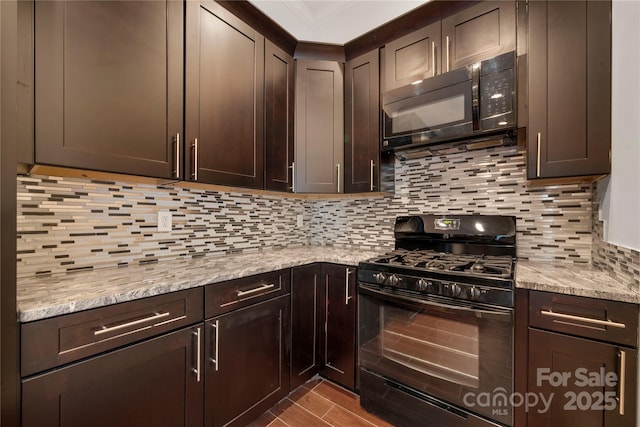 444 Snapdragon Dr, Clover, SC 29710 - kitchen featuring black appliances, dark brown cabinets, decorative backsplash, light stone counters, and wood finished floors