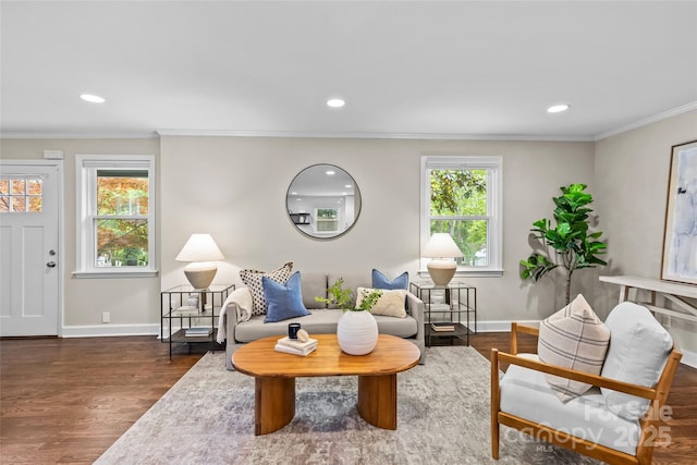 living area featuring baseboards, ornamental molding, dark wood-style floors, and recessed lighting