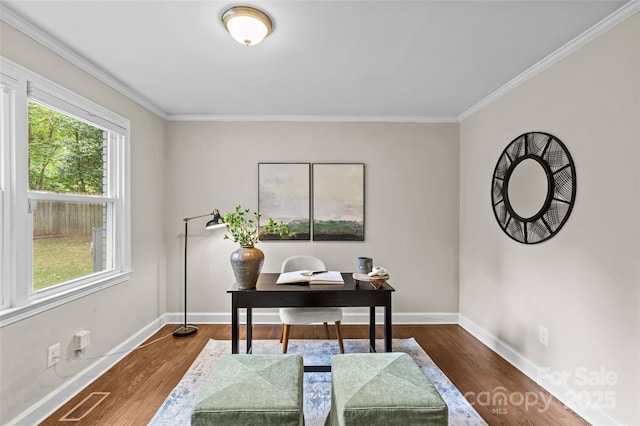 office with crown molding, baseboards, and wood finished floors