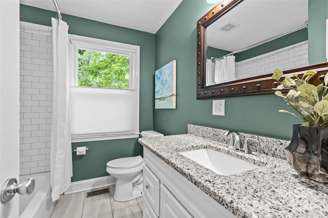 full bath with vanity, tile patterned floors, toilet, and visible vents