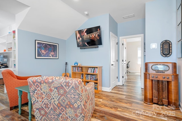 4902 Looking Glass Trl, Denver, NC 28037 - dining area with baseboards, vaulted ceiling, wood finished floors, and visible vents