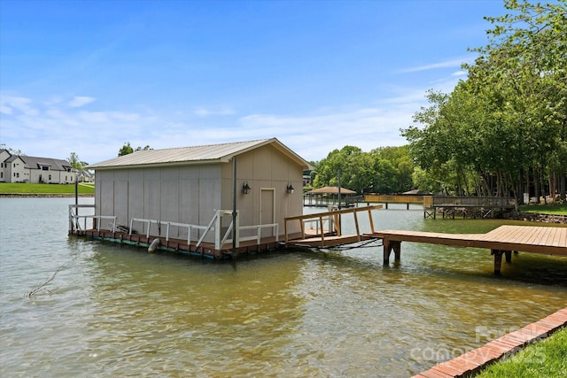 view of dock with a water view