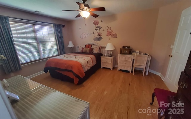 6454 Sain Milling Rd, Vale, NC 28168 - bedroom with ceiling fan, baseboards, light wood-type flooring, and visible vents