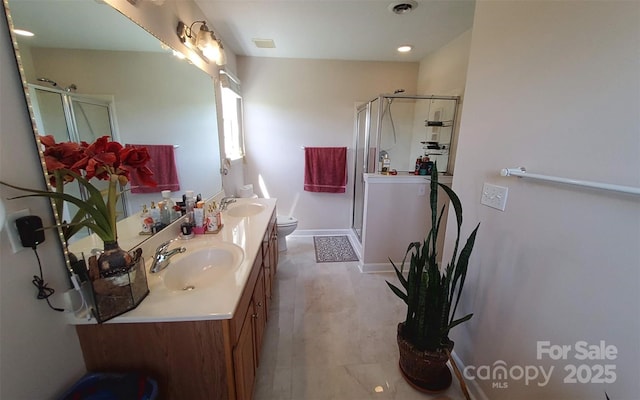 6454 Sain Milling Rd, Vale, NC 28168 - full bath with double vanity, toilet, a shower stall, and a sink
