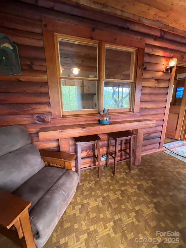 interior space featuring log walls