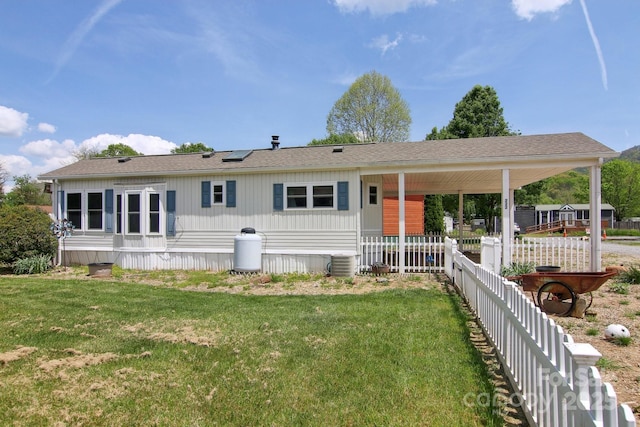 222 Pike Pt, Waynesville, NC 28785 - view of front of house featuring fence, central AC unit, and a front yard