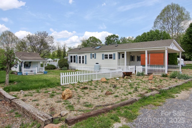 222 Pike Pt, Waynesville, NC 28785 - manufactured / mobile home featuring fence private yard, a porch, and a front yard