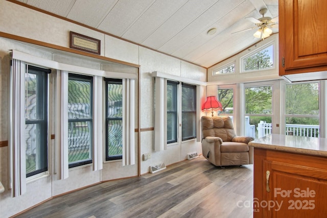 222 Pike Pt, Waynesville, NC 28785 - sunroom featuring visible vents, crown molding, wood finished floors, and vaulted ceiling