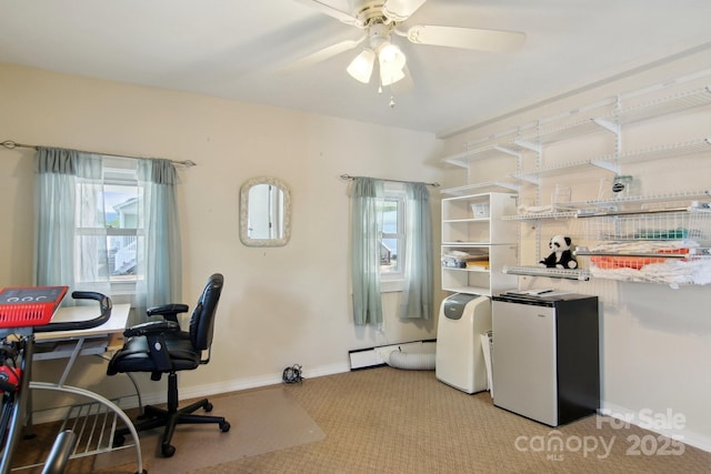 222 Pike Pt, Waynesville, NC 28785 - office space with baseboards, a baseboard radiator, a ceiling fan, and carpet flooring