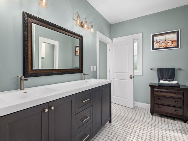 1810 Coopers Gap Rd, Mill Spring, NC 28756 - bathroom featuring double vanity, baseboards, a sink, and tile patterned floors