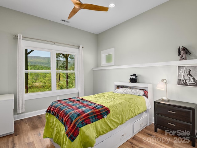 1810 Coopers Gap Rd, Mill Spring, NC 28756 - bedroom with visible vents, wood finished floors, baseboards, ceiling fan, and recessed lighting
