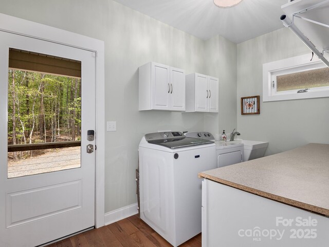1810 Coopers Gap Rd, Mill Spring, NC 28756 - washroom featuring cabinet space, a sink, separate washer and dryer, baseboards, and dark wood-style floors
