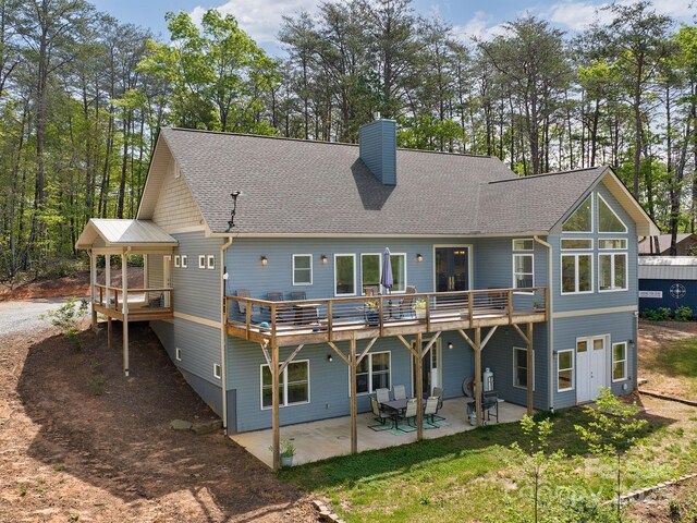 1810 Coopers Gap Rd, Mill Spring, NC 28756 - rear view of property with a shingled roof, a chimney, a patio area, and a deck