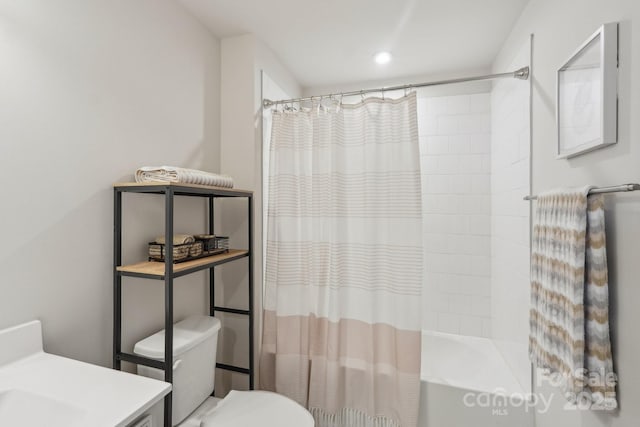 full bathroom with vanity, toilet, and shower / tub combo with curtain