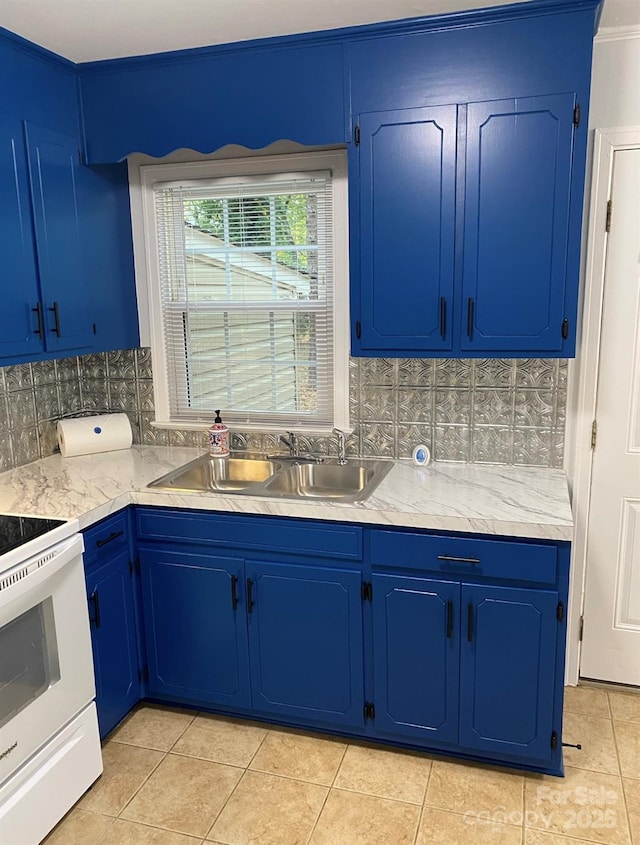 4100 Howie Cir, Charlotte, NC 28205 - kitchen featuring backsplash, a sink, blue cabinets, and electric range