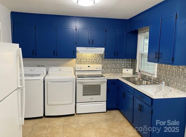 4100 Howie Cir, Charlotte, NC 28205 - kitchen featuring tasteful backsplash, under cabinet range hood, blue cabinetry, separate washer and dryer, and white appliances