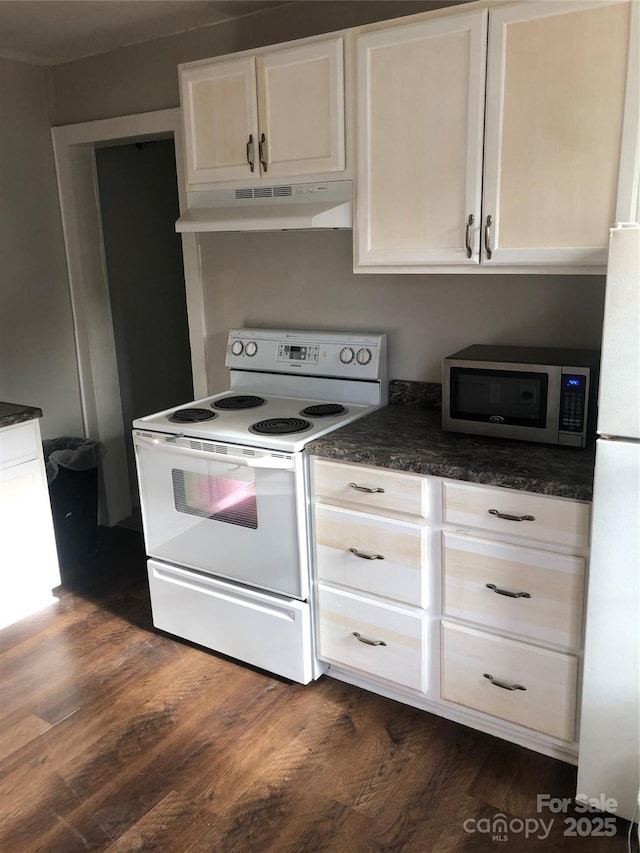 424 Skyland Ave, Charlotte, NC 28205 - kitchen featuring white cabinets, under cabinet range hood, white appliances, and dark wood-style floors