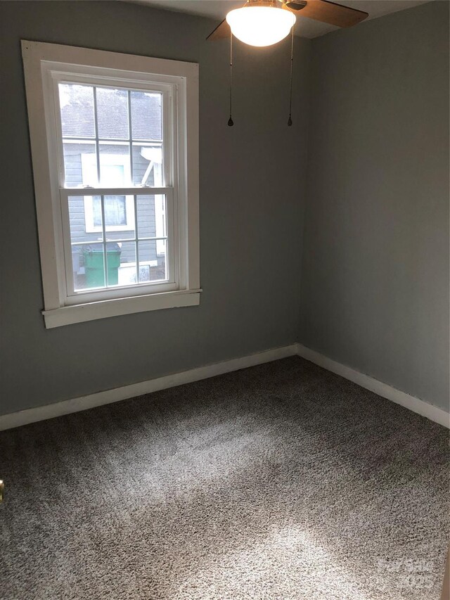 424 Skyland Ave, Charlotte, NC 28205 - unfurnished room with baseboards, carpet flooring, and ceiling fan