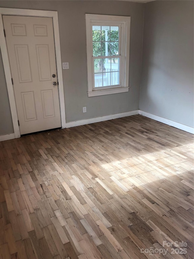 424 Skyland Ave, Charlotte, NC 28205 - foyer entrance featuring baseboards and wood finished floors
