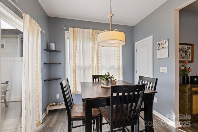 3828 Yorkshire Pl, Terrell, NC 28682 - dining area featuring baseboards and wood finished floors