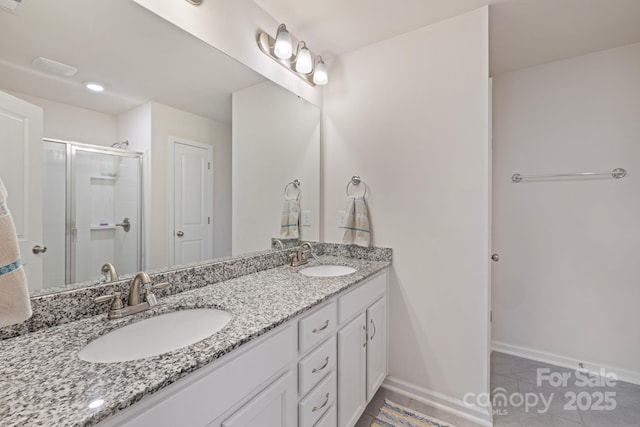 3828 Yorkshire Pl, Terrell, NC 28682 - full bath featuring baseboards, double vanity, a stall shower, and a sink