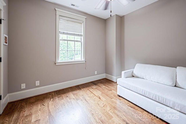 4600 Spicewood Dr, Charlotte, NC 28227 - living area with baseboards, visible vents, wood finished floors, and a ceiling fan