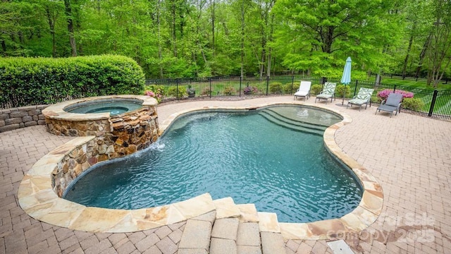 4600 Spicewood Dr, Charlotte, NC 28227 - view of pool with a patio, a fenced in pool, a forest view, an in ground hot tub, and fence