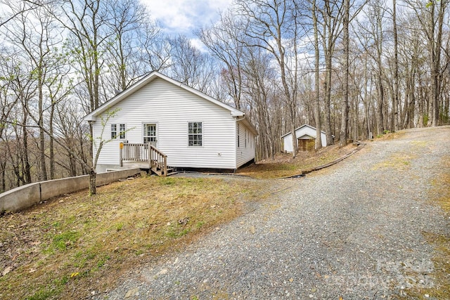 661 Old Chestnut Mountain Rd, Newland, NC 28657 - view of home's exterior featuring gravel driveway