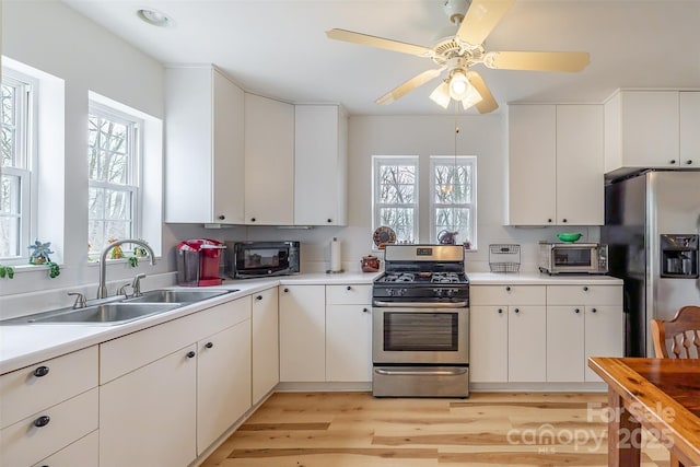 661 Old Chestnut Mountain Rd, Newland, NC 28657 - kitchen with stainless steel appliances, a sink, and light countertops
