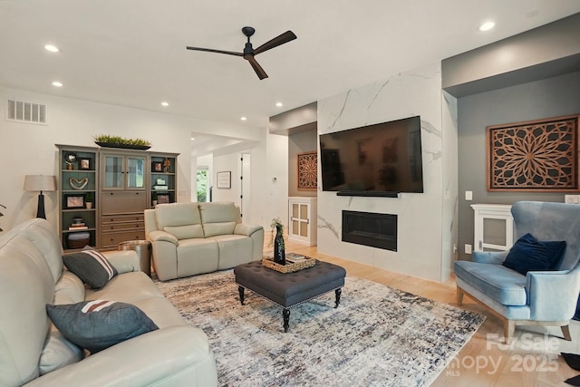 9305 Valley Rd, Charlotte, NC 28270 - living room featuring visible vents, ceiling fan, a premium fireplace, recessed lighting, and wood finished floors