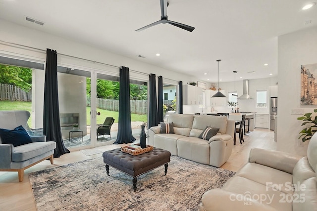 9305 Valley Rd, Charlotte, NC 28270 - living area featuring recessed lighting, a ceiling fan, visible vents, and light wood-type flooring