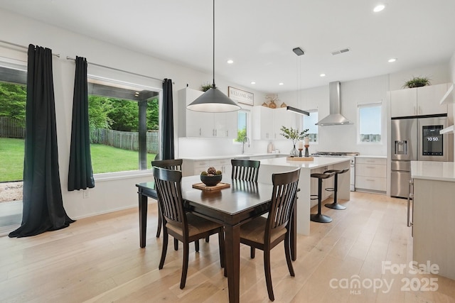 9305 Valley Rd, Charlotte, NC 28270 - dining area featuring a wealth of natural light, visible vents, light wood-type flooring, and recessed lighting