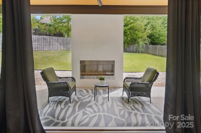 9305 Valley Rd, Charlotte, NC 28270 - view of patio / terrace with a fireplace and a fenced backyard
