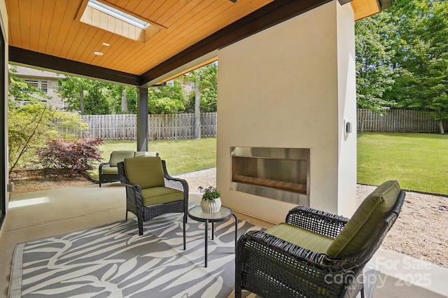 9305 Valley Rd, Charlotte, NC 28270 - view of patio / terrace featuring fence and exterior fireplace
