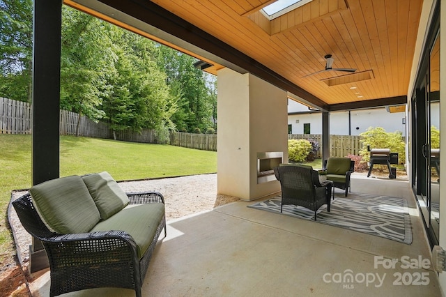 9305 Valley Rd, Charlotte, NC 28270 - view of patio with an outdoor hangout area, ceiling fan, and a fenced backyard