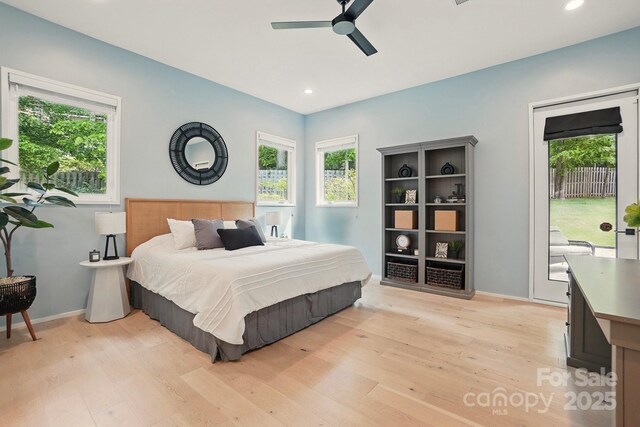 9305 Valley Rd, Charlotte, NC 28270 - bedroom with access to exterior, light wood-style floors, and multiple windows