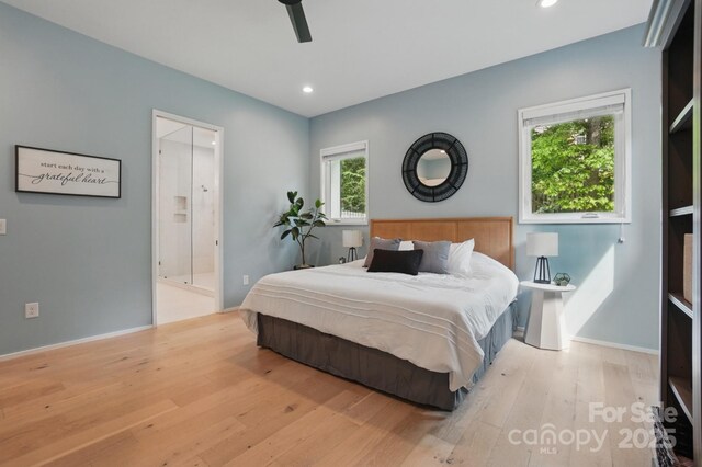 9305 Valley Rd, Charlotte, NC 28270 - bedroom with connected bathroom, recessed lighting, a ceiling fan, and wood finished floors