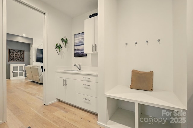 9305 Valley Rd, Charlotte, NC 28270 - mudroom featuring light wood-type flooring and a sink