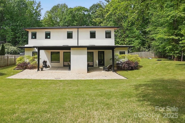 9305 Valley Rd, Charlotte, NC 28270 - back of property with a patio, fence private yard, stucco siding, and a yard